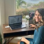Military spouse sits at her desk and opts for the FINRA Fellowship