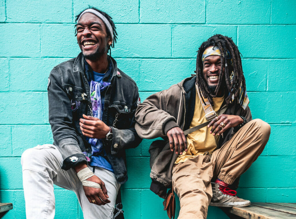 Two black men laughing together