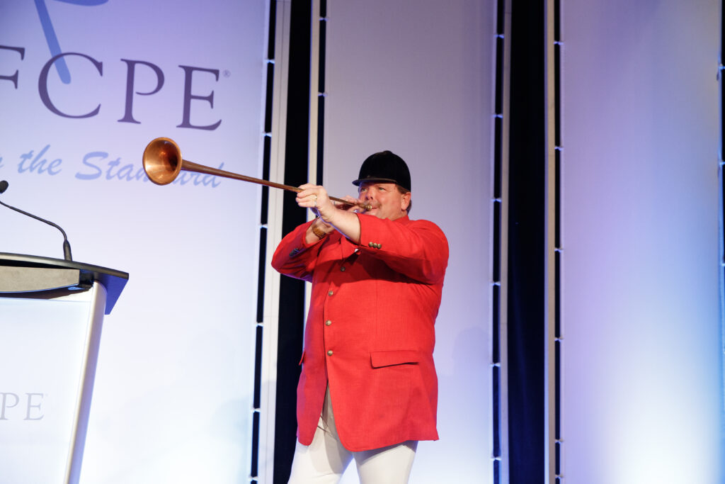 Kentucky Derby trumpet signaling the start of Symposium in Kentucky