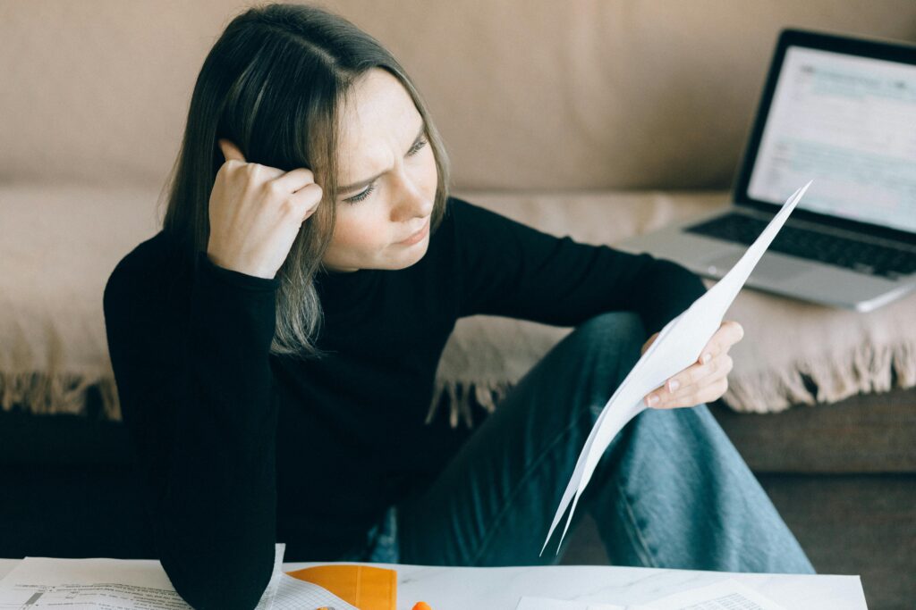 Woman reviewing reports at her desk