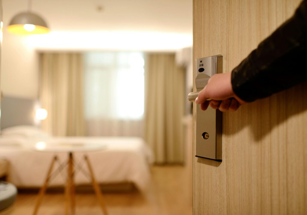 person entering their hotel room