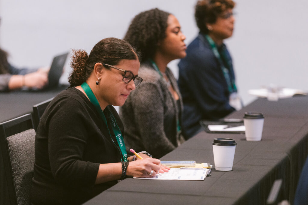 Photo of women attending an AFCPE® 2025 Symposium event.