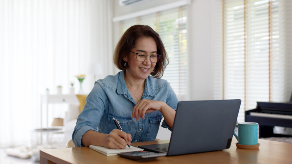 Asia adult happy people or sme owner latin lady sit consult talk in online seminar reskill upskill job discuss class for worker on desk table work at home in remote teach advice by digital training.