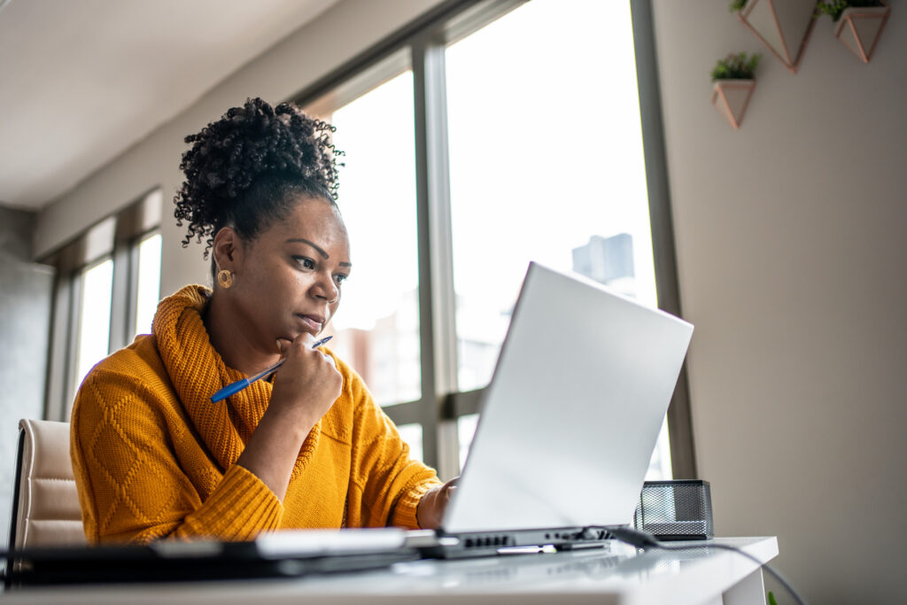 Woman working from home office.