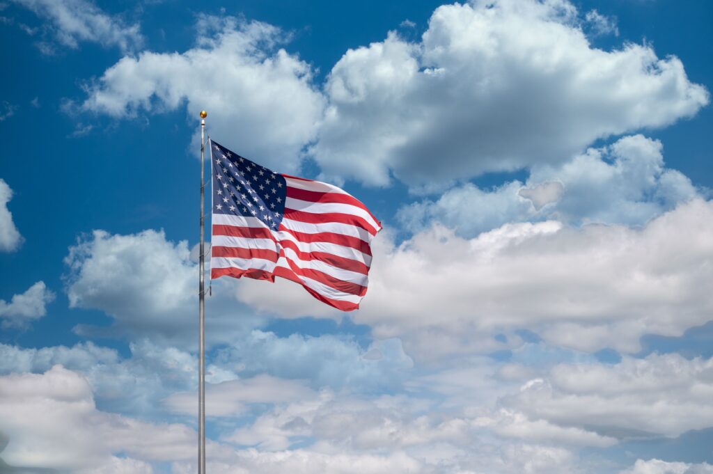 American flag waving in the sky
