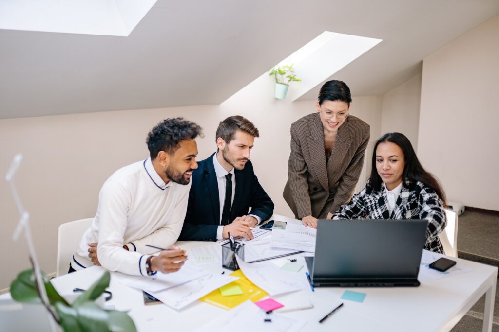 A diverse group of people at work in a conference room
