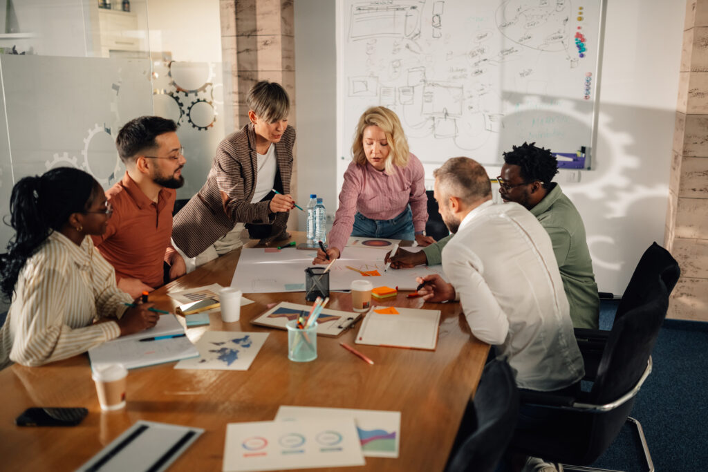Diverse team of professionals working together on a project.