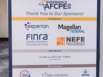 AFCPE Symposium sign listing all sponsors